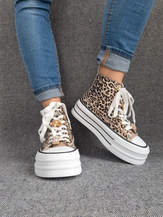 Chaussures baskets hautes semelle compensée en simili motif léopard style converse