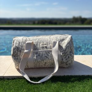 Sac polochon blanc en coton liberty fleuri noir