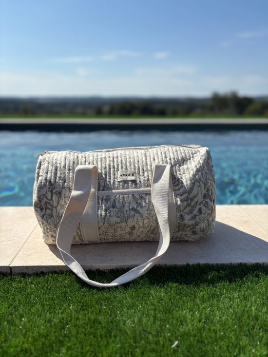 Sac polochon blanc en coton liberty fleuri noir