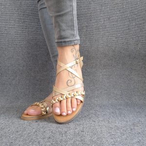 Chaussures sandales plates à brides doré