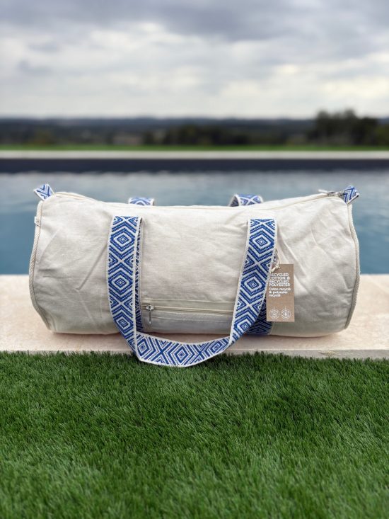 Sac polochon en coton tissu beige avec poignées motifs géométriques en bleu et blanc