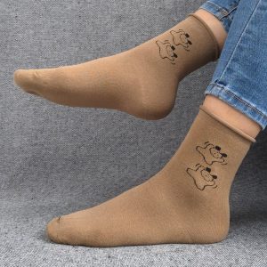 Paire de chaussettes marrons en coton à motifs deux petits chiens noirs