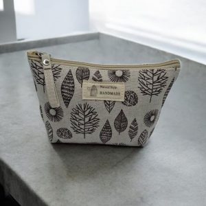 Trousse en coton blanche motifs de feuilles et de cercles en marron