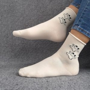 Paire de chaussettes blanches en coton à motifs deux petits chiens noirs