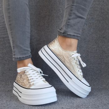 Chaussures baskets basses semelle compensée tissu rigide doré avec motifs zebré style converse plateforme