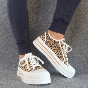 Chaussures baskets blanches à motif léopard semelle compensée style converse