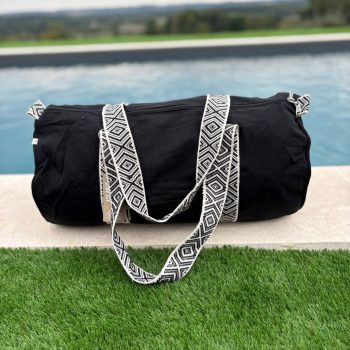 Sac polochon en coton tissu noir avec poignées motifs géométriques en noir et blanc