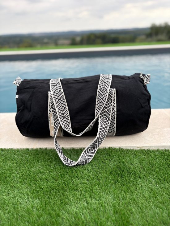 Sac polochon en coton tissu noir avec poignées motifs géométriques en noir et blanc