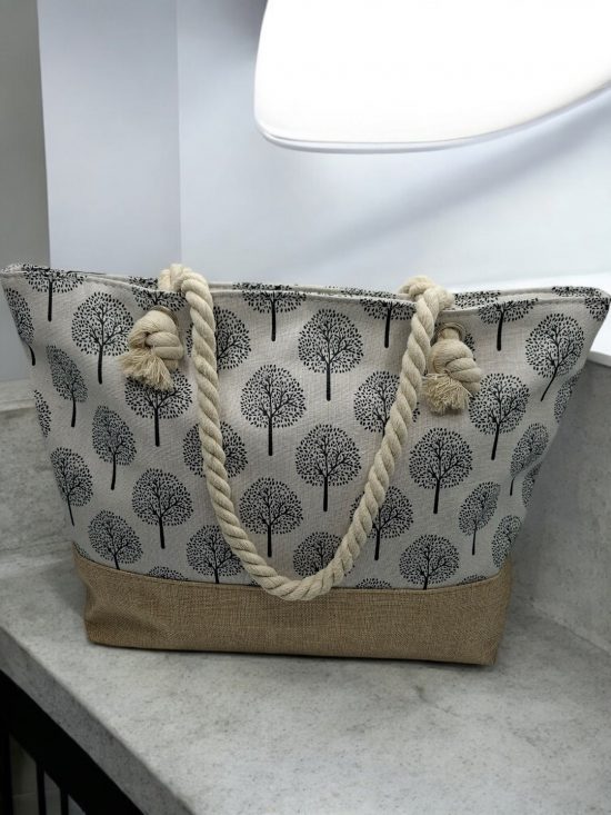 Sac à main de plage porté à l’épaule blanc motifs arbres
